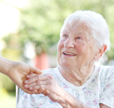 senior woman shaking hands