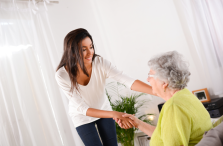 provider of personal care in Annapolis Valley sitting with elderly patient