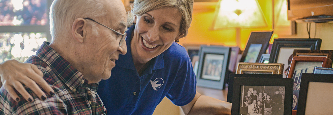 caregiver smiling with senior